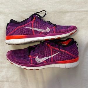 Nike womens FlyKnit FREE 5.0 Purple/ neon orange SZ 8M- light wear/scuff